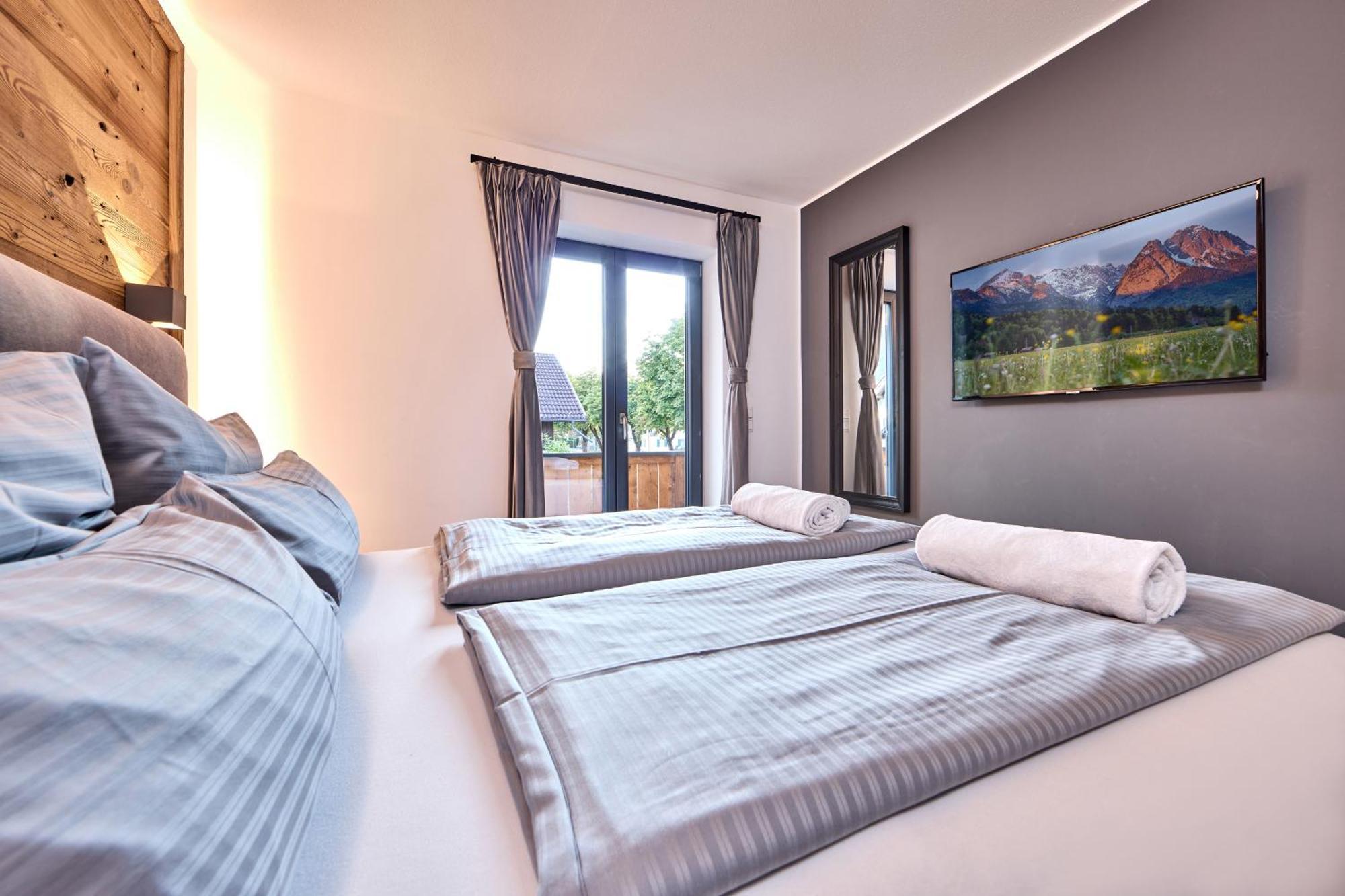 Apartment Wood&Stone Alpi การ์มิช-พาร์เทนเคียร์เชน ภายนอก รูปภาพ